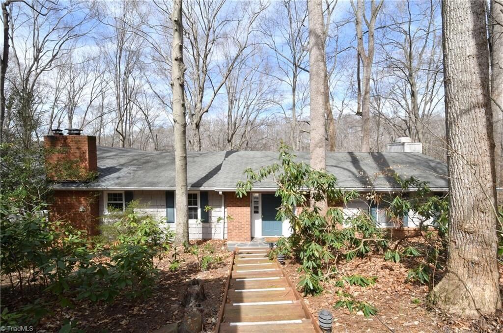 The Journey Begins with Our Mid-Century Modern Ranch 1 front of our Mid-Century Modern Ranch