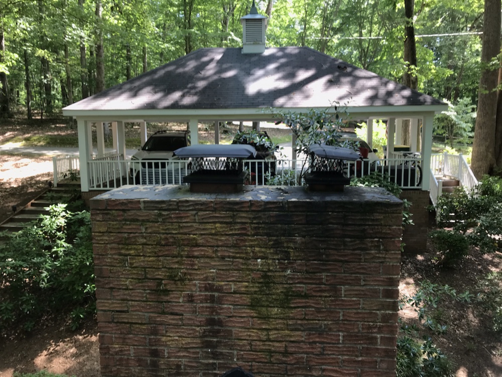 Old black worn out chimney caps