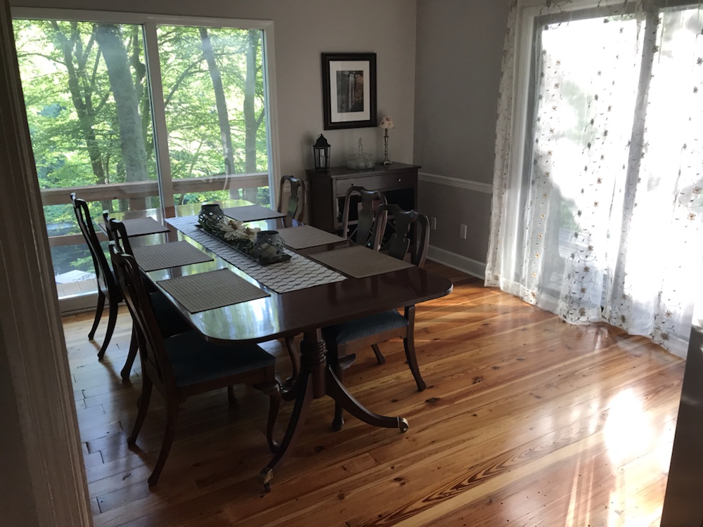 Dining room heart of pine wood flooring installed