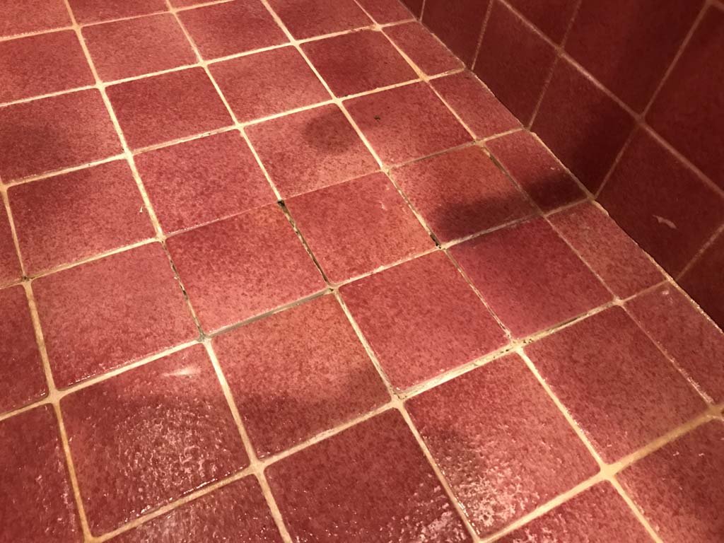 Finished repair on loose shower tile