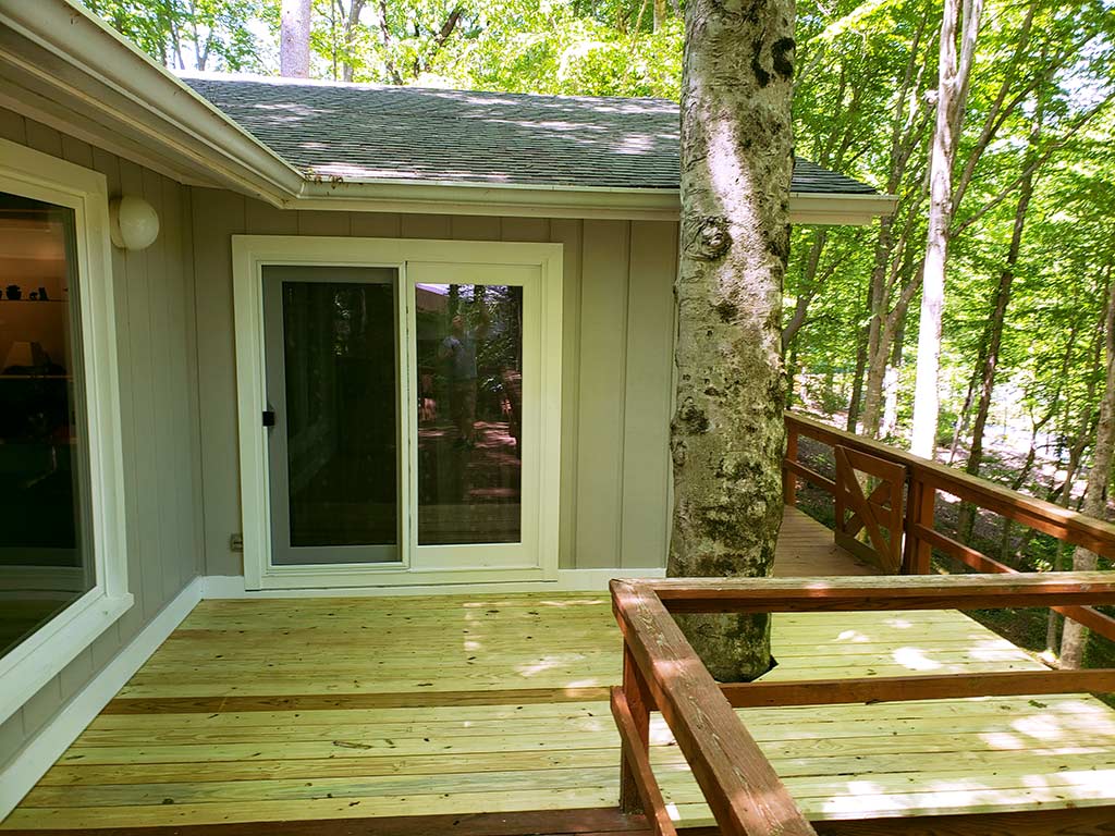 Successful Deck Refinishing and Essential Repair to a Staircase 3 New Deck Boards and PVC Trim