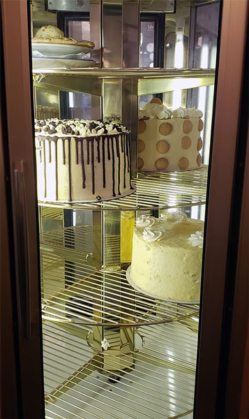 A Tasteful Mid-Century Modern Designed Restaurant 8 Mama Zoe cake rack