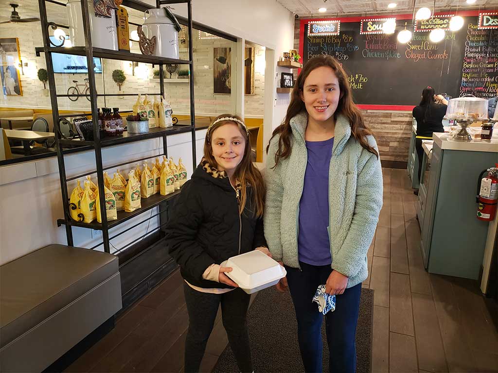 Two Girls at a Mid-Century Moders Restaurant