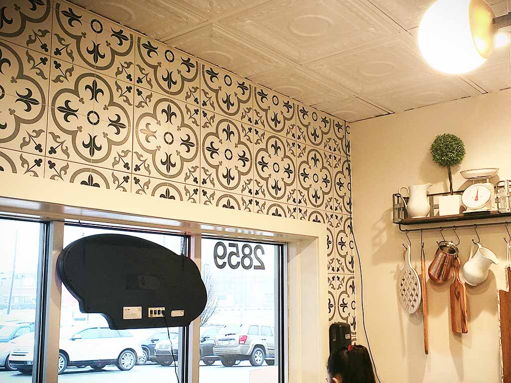 A Tasteful Mid-Century Modern Designed Restaurant 4 Mama Zoes front mcmc tile wall