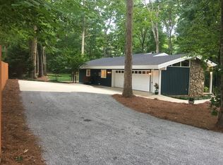 House Tour: Period Perfection 1973 Mid-Century Modern 4 1973 Mid-Century Modern orange garage door