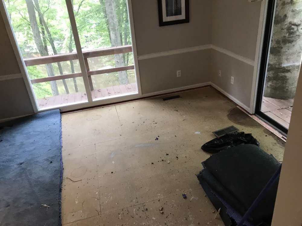 Replacement of carpet with Heart of Pine wood flooring