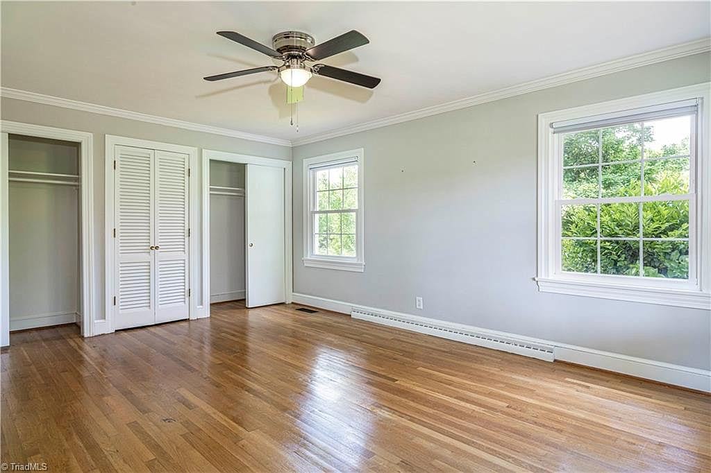 master bedroom mid-century oak flooring