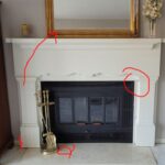 Mid-Century-Modern-bedroom-fireplace-mantle-mounted-to-wall last items to finish up - paint mirror, paint and cover screw holes and polish up marble tile