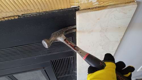 take your time hammer removing marble tile from wall