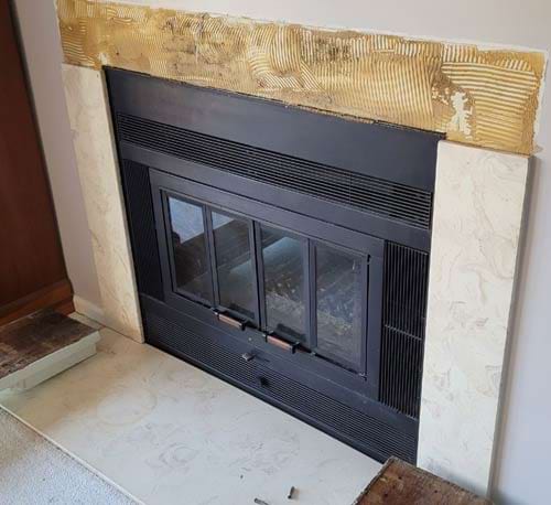 removing old marble tile from fireplace