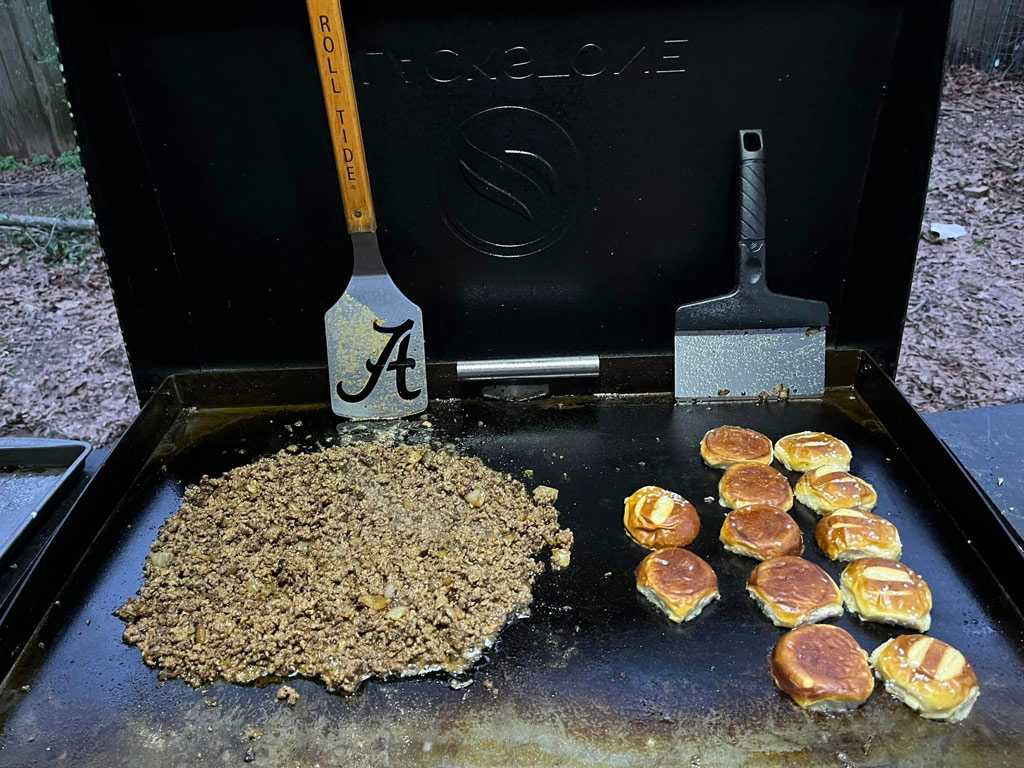 Blackstone Griddle cooking beef and buns