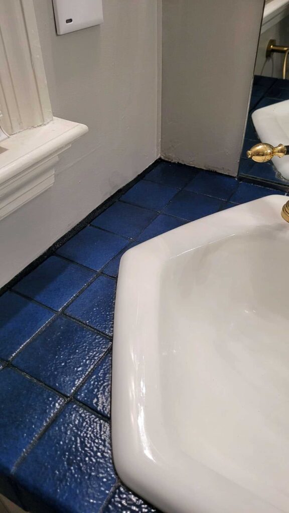 How to Restore or Change Stained Grout Color in Seconds 20 New black Grout dye in a Mid Century Modern bathroom 1